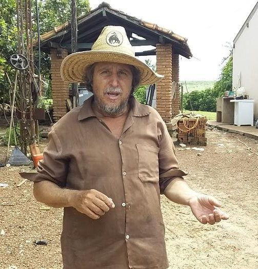 photo of man in a straw hat